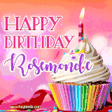 A vibrant birthday GIF featuring a rainbow-colored cupcake topped with white frosting, sprinkles, and a lit candle. The text reads 'Happy Birthday Rosemonde' in bold pink and violet letters with white outline.