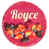 Beautifully decorated red velvet berry birthday cake with vibrant fruits and a glowing 'Royce' name, adding a touch of sweetness and sparkle.