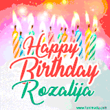 Bright birthday candles with rainbow flames on a cake, alongside the text 'Happy Birthday Rozalija' in vibrant script in this celebratory animated GIF.