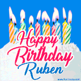 A cheerful animated GIF featuring colorful lit birthday candles on a white cake, with the text 'Happy Birthday Ruben' in bold red and blue script on a bright blue background.