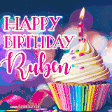 A festive animated GIF featuring a colorful cupcake with a single lit candle, sprinkles, and 'Happy Birthday Ruben' text against a sparkling, celebratory background.