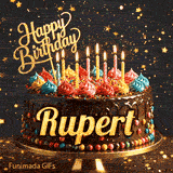 A birthday cake with colorful frosting swirls, burning candles, and the name Rupert on a dark, sparkly background.