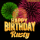 A captivating GIF with bursts of green, pink, and orange fireworks lighting up the night sky, accompanied by 'Happy Birthday Rusty' in glowing golden text.