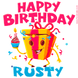 A funny animated birthday GIF with the words 'Happy Birthday Rustya', colorful gift box with arms and legs, holding a cupcake with a lit candle  with confetti everywhere.