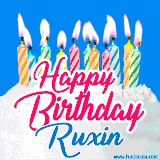 A cheerful animated GIF featuring colorful lit birthday candles on a white cake, with the text 'Happy Birthday Ruxin' in bold red and blue script on a bright blue background.