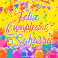A bright and festive GIF with the text 'Feliz Cumpleaños Sahasra' in Spanish in colorful fonts, surrounded by confetti, balloons, and festive banners on a vibrant yellow background.