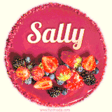 Beautifully decorated red velvet berry birthday cake with vibrant fruits and a glowing 'Sally' name, adding a touch of sweetness and sparkle.