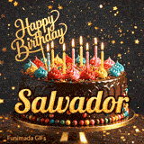 Golden lettering spelling Salvador on a rich chocolate birthday cake decorated with rainbow sprinkles.