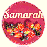 Beautifully decorated red velvet berry birthday cake with vibrant fruits and a glowing 'Samarah' name, adding a touch of sweetness and sparkle.