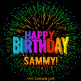 A colorful animated GIF featuring the text 'Happy Birthday Sammy!' in rainbow colors with a dynamic iridescent firework display in the background.