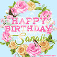 A charming animated GIF featuring 'Happy Birthday Sanaii' in pink and green text, surrounded by delicate roses, leaves, and fluttering butterflies on a soft light blue pastel background.