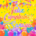 A bright and festive GIF with the text 'Feliz Cumpleaños Sanaya' in Spanish in colorful fonts, surrounded by confetti, balloons, and festive banners on a vibrant yellow background.