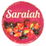 Beautifully decorated red velvet berry birthday cake with vibrant fruits and a glowing 'Saraiah' name, adding a touch of sweetness and sparkle.