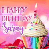 A vibrant birthday GIF featuring a rainbow-colored cupcake topped with white frosting, sprinkles, and a lit candle. The text reads 'Happy Birthday Saray' in bold pink and violet letters with white outline.
