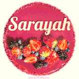 Beautifully decorated red velvet berry birthday cake with vibrant fruits and a glowing 'Sarayah' name, adding a touch of sweetness and sparkle.
