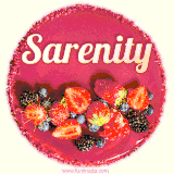 Beautifully decorated red velvet berry birthday cake with vibrant fruits and a glowing 'Sarenity' name, adding a touch of sweetness and sparkle.