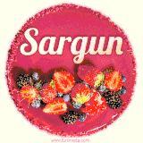 Beautifully decorated red velvet berry birthday cake with vibrant fruits and a glowing 'Sargun' name, adding a touch of sweetness and sparkle.