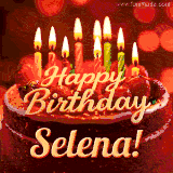 Beautifully decorated red velvet berry birthday cake with vibrant fruits and a glowing 'Selena' name, adding a touch of sweetness and sparkle.