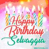 Bright birthday candles with rainbow flames on a cake, alongside the text 'Happy Birthday Selvaggia' in vibrant script in this celebratory animated GIF.