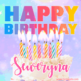 A vibrant animated name GIF with the words 'Happy Birthday Seweryna' with colorful candles on a creamy cake. The background sparkles with pastel shades, adding a festive touch.