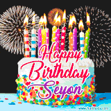 A lively happy birthday animated GIF showcasing a colorful birthday cake covered in sprinkles, topped with glowing candles, and surrounded by vibrant fireworks. The name 'Seyon' is featured in elegant script.