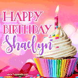 A vibrant birthday GIF featuring a rainbow-colored cupcake topped with white frosting, sprinkles, and a lit candle. The text reads 'Happy Birthday Shaelyn' in bold pink and violet letters with white outline.