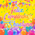 A bright and festive GIF with the text 'Feliz Cumpleaños Shaelynn' in Spanish in colorful fonts, surrounded by confetti, balloons, and festive banners on a vibrant yellow background.