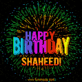 A colorful animated GIF featuring the text 'Happy Birthday Shaheed!' in rainbow colors with a dynamic iridescent firework display in the background.