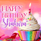 A vibrant birthday GIF featuring a rainbow-colored cupcake topped with white frosting, sprinkles, and a lit candle. The text reads 'Happy Birthday Shahira' in bold pink and violet letters with white outline.