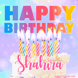 A vibrant animated name GIF with the words 'Happy Birthday Shahira' with colorful candles on a creamy cake. The background sparkles with pastel shades, adding a festive touch.