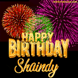 A golden 'Happy Birthday Shaindy' message with vibrant fireworks in the background, creating a festive and celebratory vibe in this animated name GIF.