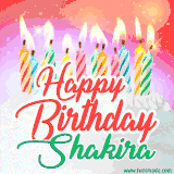 Bright birthday candles with rainbow flames on a cake, alongside the text 'Happy Birthday Shakira' in vibrant script in this celebratory animated GIF.