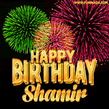 A captivating GIF with bursts of green, pink, and orange fireworks lighting up the night sky, accompanied by 'Happy Birthday Shamir' in glowing golden text.