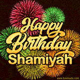 Golden text reading 'Happy Birthday Shamiyah' surrounded by vibrant fireworks in red, green, and yellow, set against a dark background in this celebratory birthday GIF.