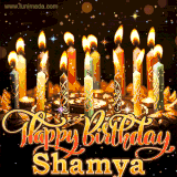 A glowing personalized birthday GIF with name Shamya featuring lit candles with intricate designs, warm lighting, and the text 'Happy Birthday' in an elegant font.