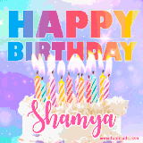 A vibrant animated name GIF with the words 'Happy Birthday Shamya' with colorful candles on a creamy cake. The background sparkles with pastel shades, adding a festive touch.