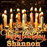 A glowing personalized birthday GIF with name Shannon featuring lit candles with intricate designs, warm lighting, and the text 'Happy Birthday' in an elegant font.