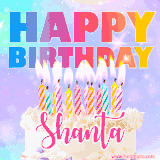 A vibrant animated name GIF with the words 'Happy Birthday Shanta' with colorful candles on a creamy cake. The background sparkles with pastel shades, adding a festive touch.