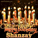 A glowing personalized birthday GIF with name Shanzay featuring lit candles with intricate designs, warm lighting, and the text 'Happy Birthday' in an elegant font.
