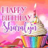 A vibrant birthday GIF featuring a rainbow-colored cupcake topped with white frosting, sprinkles, and a lit candle. The text reads 'Happy Birthday Sharalyn' in bold pink and violet letters with white outline.
