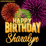 A golden 'Happy Birthday Sharalyn' message with vibrant fireworks in the background, creating a festive and celebratory vibe in this animated name GIF.