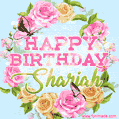 A charming animated GIF featuring 'Happy Birthday Shariah' in pink and green text, surrounded by delicate roses, leaves, and fluttering butterflies on a soft light blue pastel background.