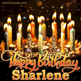 A glowing personalized birthday GIF with name Sharlene featuring lit candles with intricate designs, warm lighting, and the text 'Happy Birthday' in an elegant font.