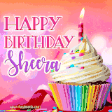 A vibrant birthday GIF featuring a rainbow-colored cupcake topped with white frosting, sprinkles, and a lit candle. The text reads 'Happy Birthday Sheera' in bold pink and violet letters with white outline.