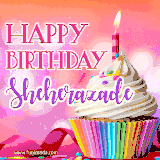 A vibrant birthday GIF featuring a rainbow-colored cupcake topped with white frosting, sprinkles, and a lit candle. The text reads 'Happy Birthday Sheherazade' in bold pink and violet letters with white outline.