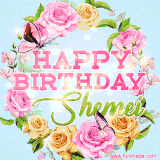 A charming animated GIF featuring 'Happy Birthday Shemei' in pink and green text, surrounded by delicate roses, leaves, and fluttering butterflies on a soft light blue pastel background.