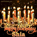 A glowing personalized birthday GIF with name Shia featuring lit candles with intricate designs, warm lighting, and the text 'Happy Birthday' in an elegant font.