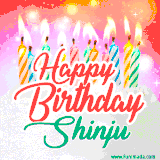 Bright birthday candles with rainbow flames on a cake, alongside the text 'Happy Birthday Shinju' in vibrant script in this celebratory animated GIF.