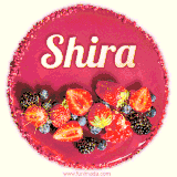 Beautifully decorated red velvet berry birthday cake with vibrant fruits and a glowing 'Shira' name, adding a touch of sweetness and sparkle.