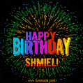 A colorful animated GIF featuring the text 'Happy Birthday Shmiel!' in rainbow colors with a dynamic iridescent firework display in the background.